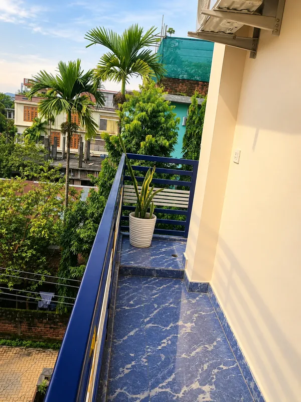 Simolu Suite balcony overlooking palm trees